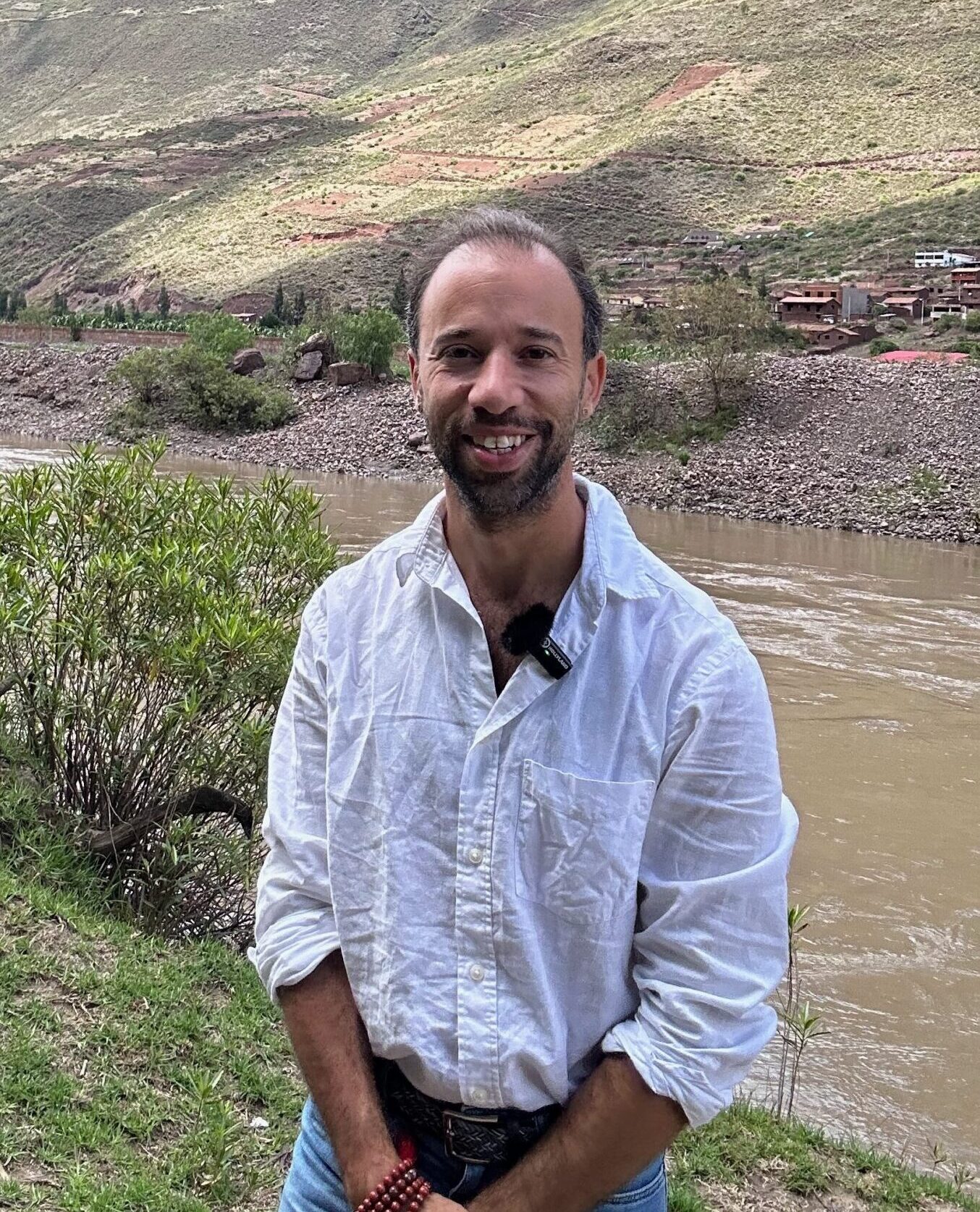 Adam by the river in the Sacred Valley, Peru